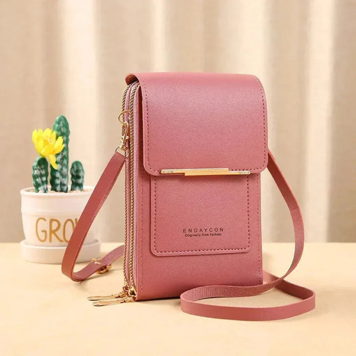 Stylish women's black crossbody phone bag with transparent touch screen window & adjustable strap for easy access.