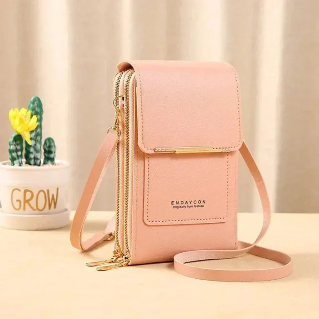 Organized ladies' touch screen phone crossbody bag, with strap, for secure and hands-free daily essentials.