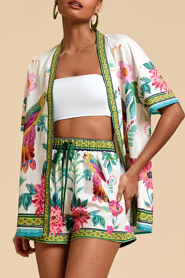 Effortless chic women's two-piece tropical floral print shorts set, ideal for beach or resort wear.