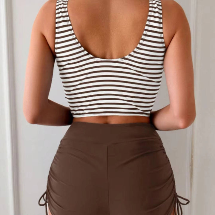 Comfortable two-piece women's swimwear: twist front tankini & high waisted for vacation.