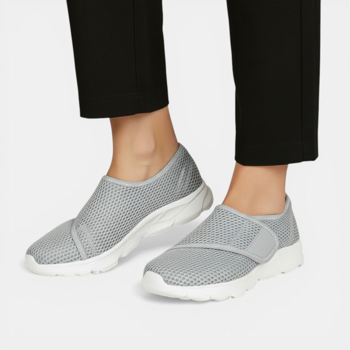 Women's ultra lightweight orthopedic walking sneakers with arch support for comfort & active lifestyle.
