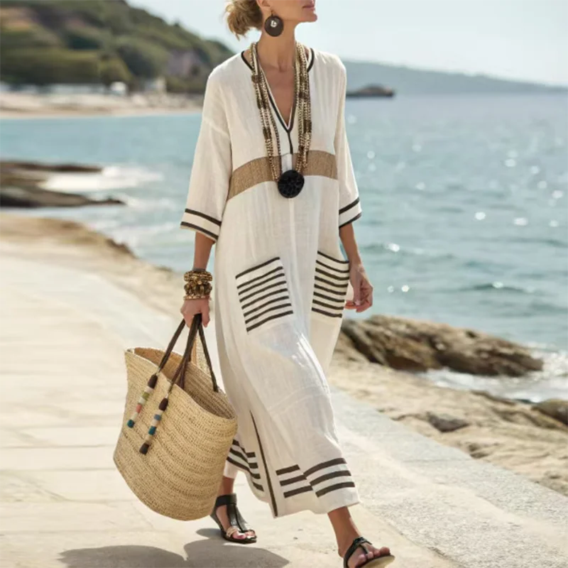 Effortless women's V-neck kimono maxi dress for beach vacations. Chic summer fashion with a comfortable, relaxed fit.