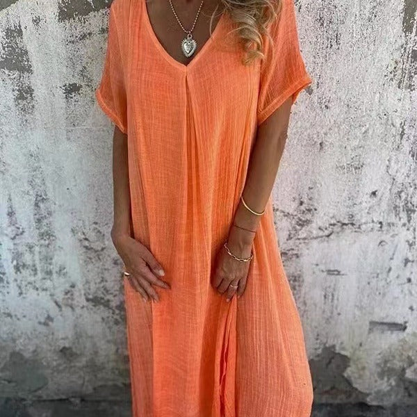 Versatile women's V-neck midi dress, loose fit for effortless style. Perfect for casual, elegant, or summer wear.