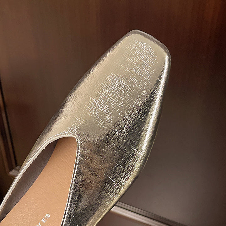 Modern vegan leather women's flats, comfortable slip-on design for effortless everyday style.