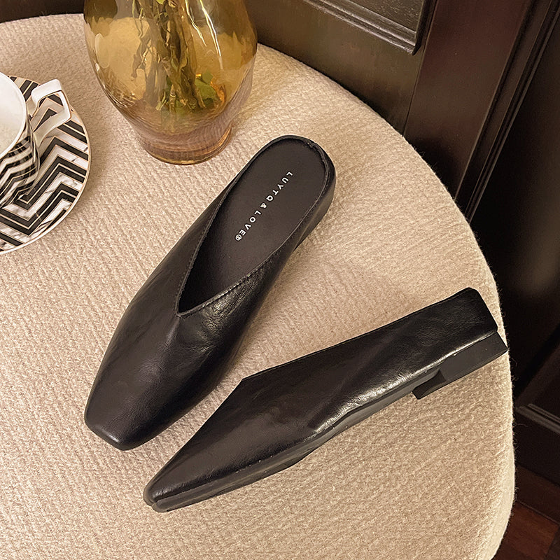 Elegant women's vegan leather flats, easy slip-on style for sophisticated everyday fashion.