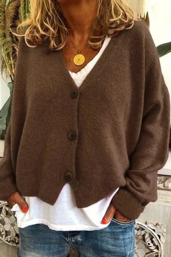 Office-ready button cardigan for women, blending style with everyday comfort.