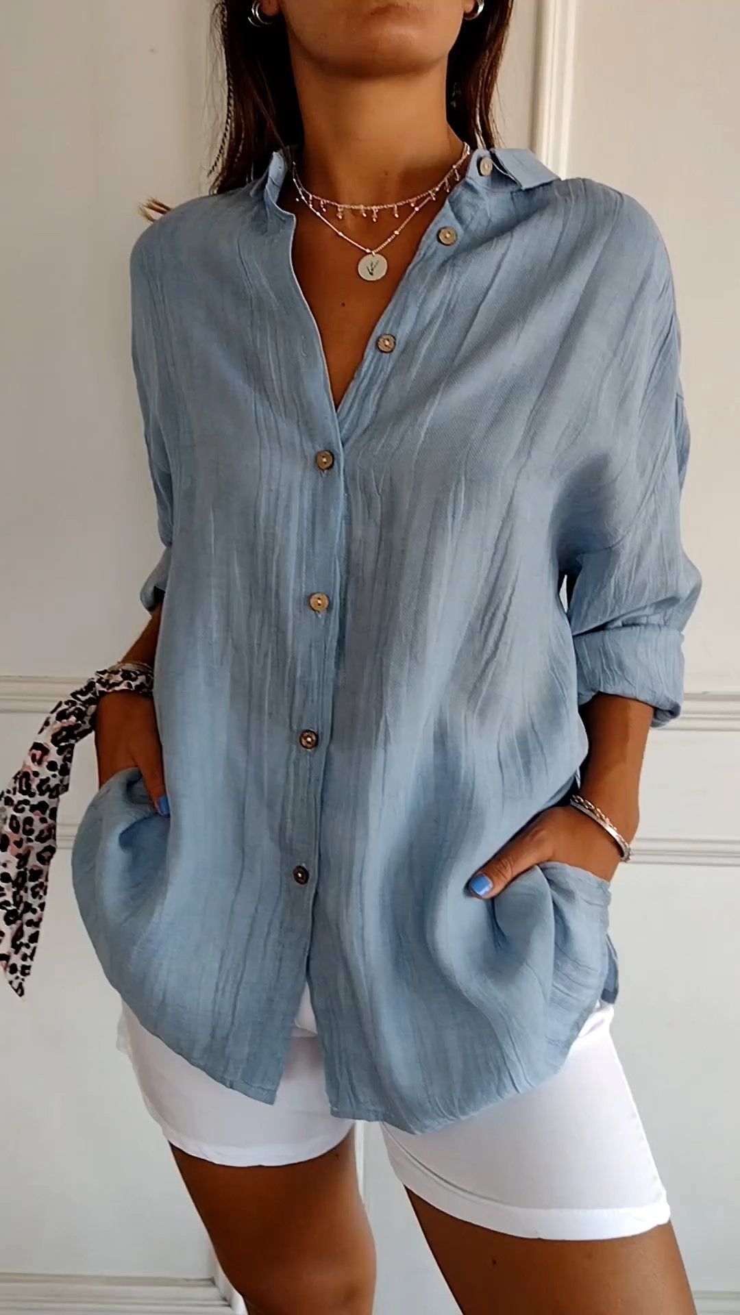 Women's versatile long sleeve button-down shirt, oversized for a relaxed fit, perfect casual everyday wear.