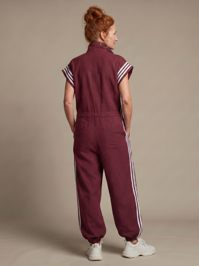 Elegant women's striped zip front jumpsuit, ideal for casual and formal occasions.