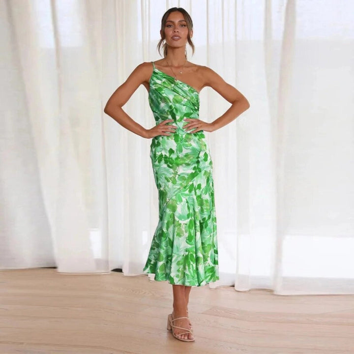 Women's special occasion floral asymmetric dress with a flattering sleeveless design and midi length.