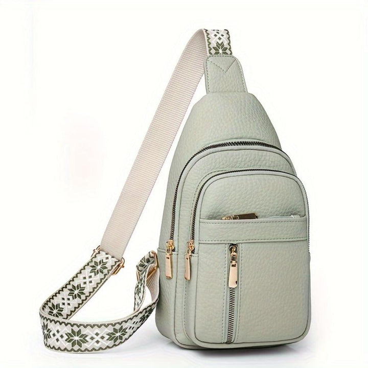 Versatile women's vintage leather crossbody bag, functioning as a chic chest or shoulder purse.