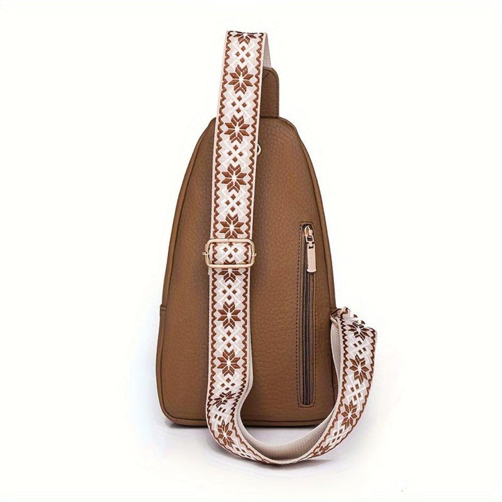 Women's vintage leather crossbody bag with adjustable strap, ideal as a chest or shoulder purse.