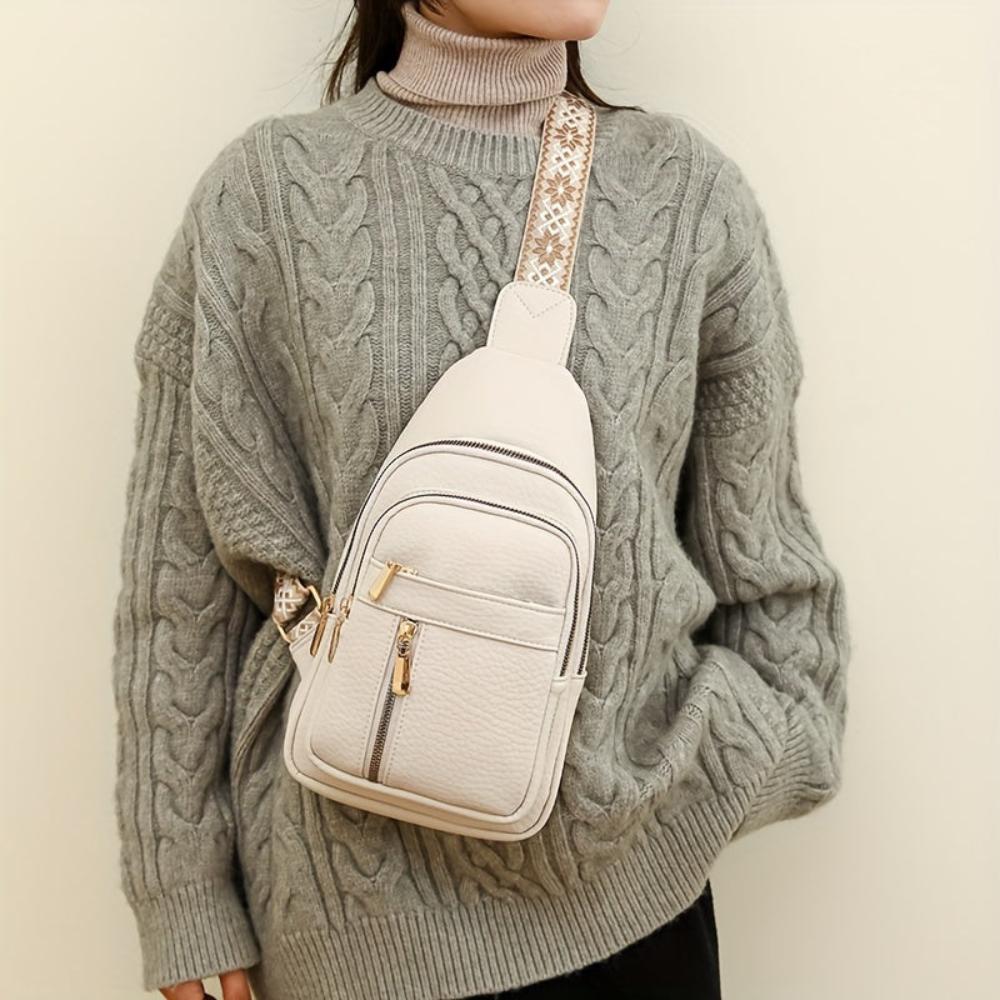 Women's vintage travel crossbody bag, secure chest style, durable & practical.