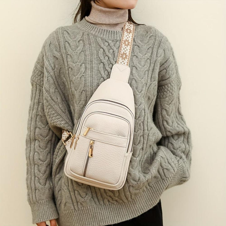 Women's vintage travel crossbody bag, secure chest style, durable & practical.
