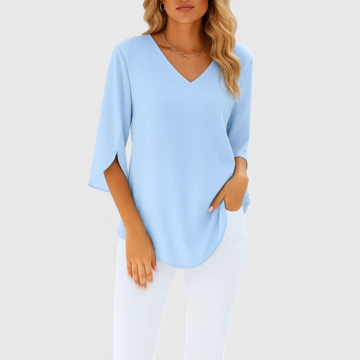 Women's Violetta sophisticated V-neck blouse, elegant and versatile for day to night wear.