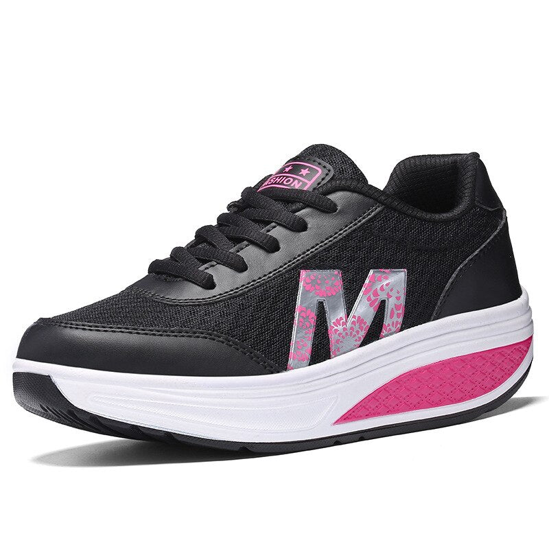 Women's walking sneakers with supportive design, breathable upper for comfortable daily wear.