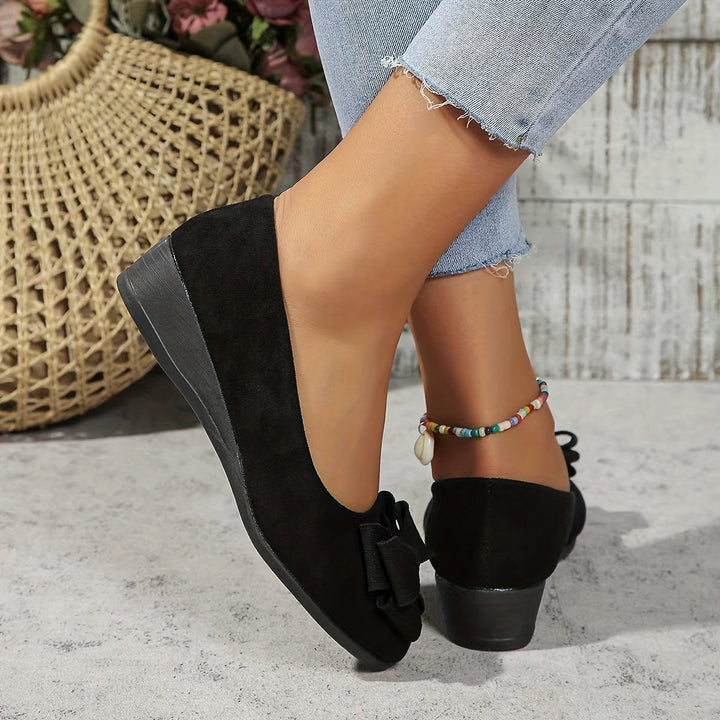 Stylish ladies wedge ballet flats, featuring a charming bow and round toe, perfect for everyday use.