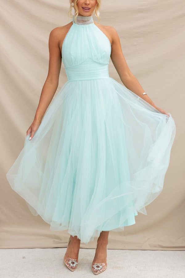 Women's whimsical layered tulle midi dress, versatile for parties, formal wear, and events.