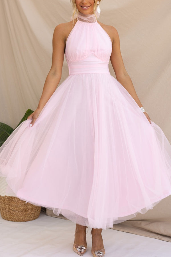 Front view of a women's whimsical layered tulle midi dress, ideal for parties & evenings.