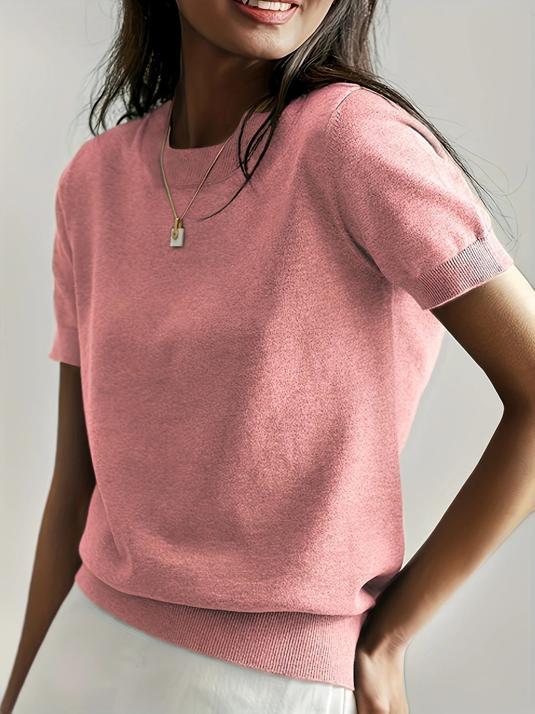 Yellow women's ribbed short sleeve top, crew neck style, ideal for a cheerful summer day.