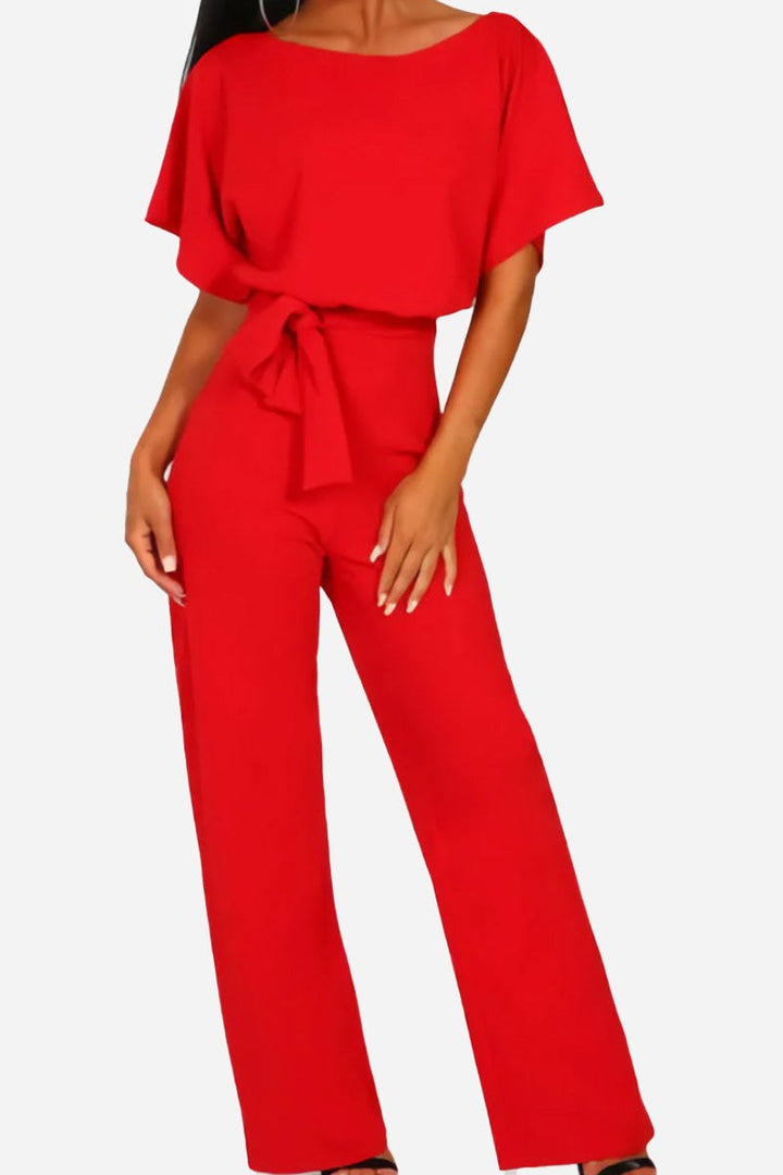 Comfortable women's wide-leg jumpsuit with stylish batwing sleeves. Versatile, belted one-piece for casual or evening.