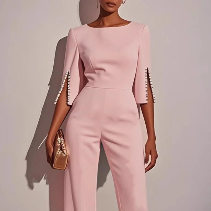 Women's wide leg jumpsuit with pearl sleeves, a versatile piece for elegant and casual spring outfits.