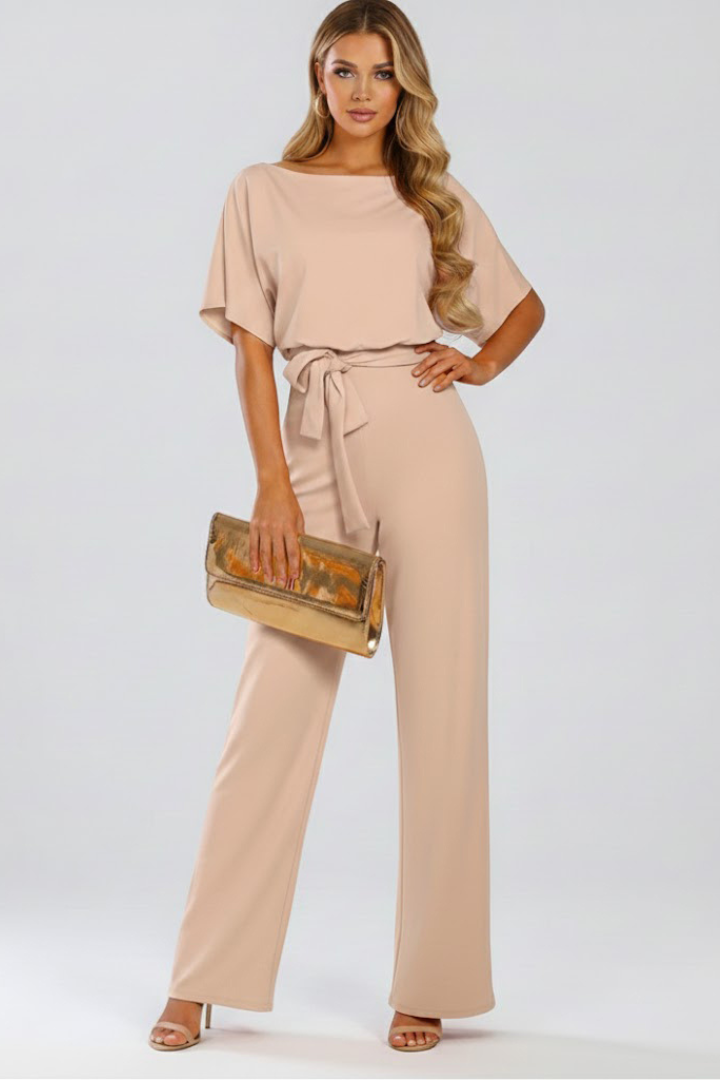 Elegant women's belted wide leg jumpsuit. Short sleeve, one-piece design for casual chic summer wear.