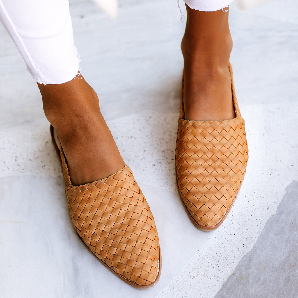 Women's woven closed toe mules, elegant slip-on flats for smart casual wear.