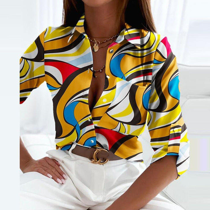 Modern women's printed long sleeve button-down blouse, great for a stylish casual look.