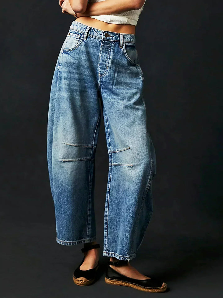 Versatile women's high-rise wide-leg denim jeans, ideal for effortless modern style and daily wear.