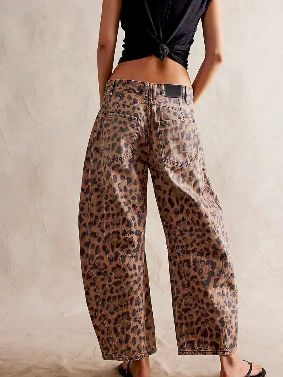 Chic women's high-waisted wide-leg denim jeans, offering effortless style for versatile casual outfits.