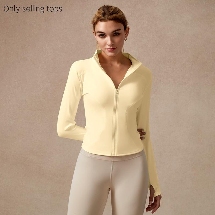 Performance full-zip top, women's activewear with thumbholes, perfect for studio.