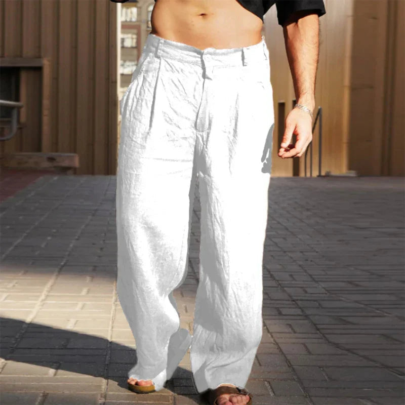 High-waisted loose fit men's pleated wide leg trousers, perfect for versatile casual wear.